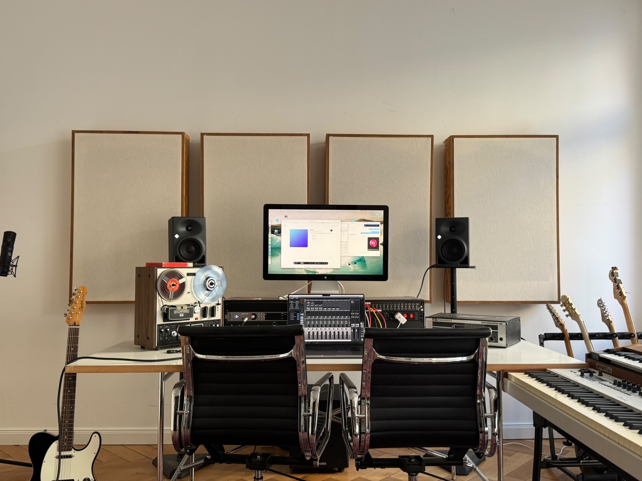 Control desk with monitors, tape machine and custom acoustic panels