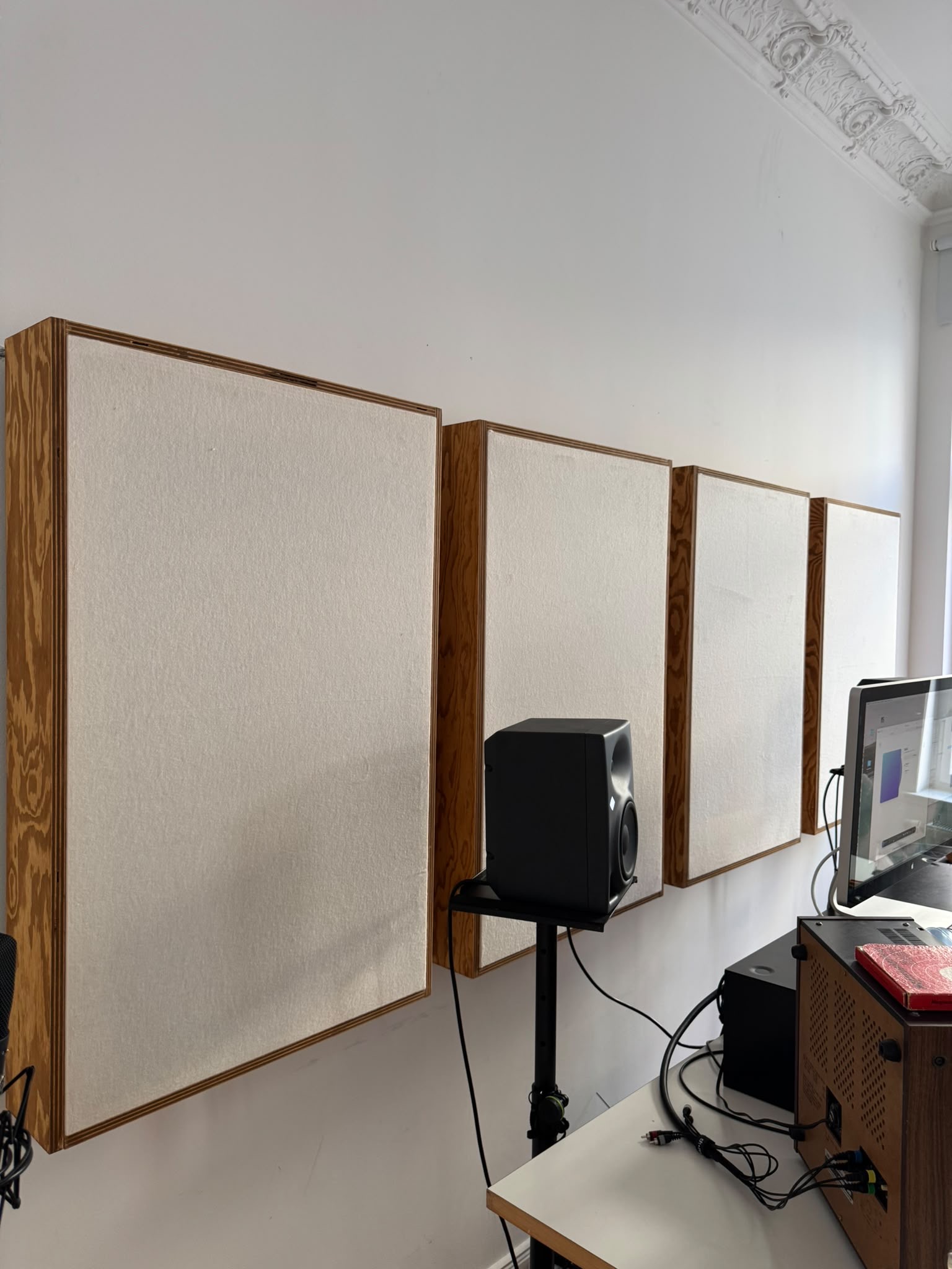 Custom acoustic panels above the monitoring setup